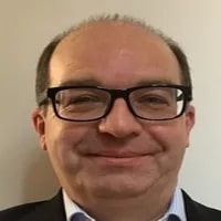 Wojciech_Dochan seen posing for a photo with specs on his face